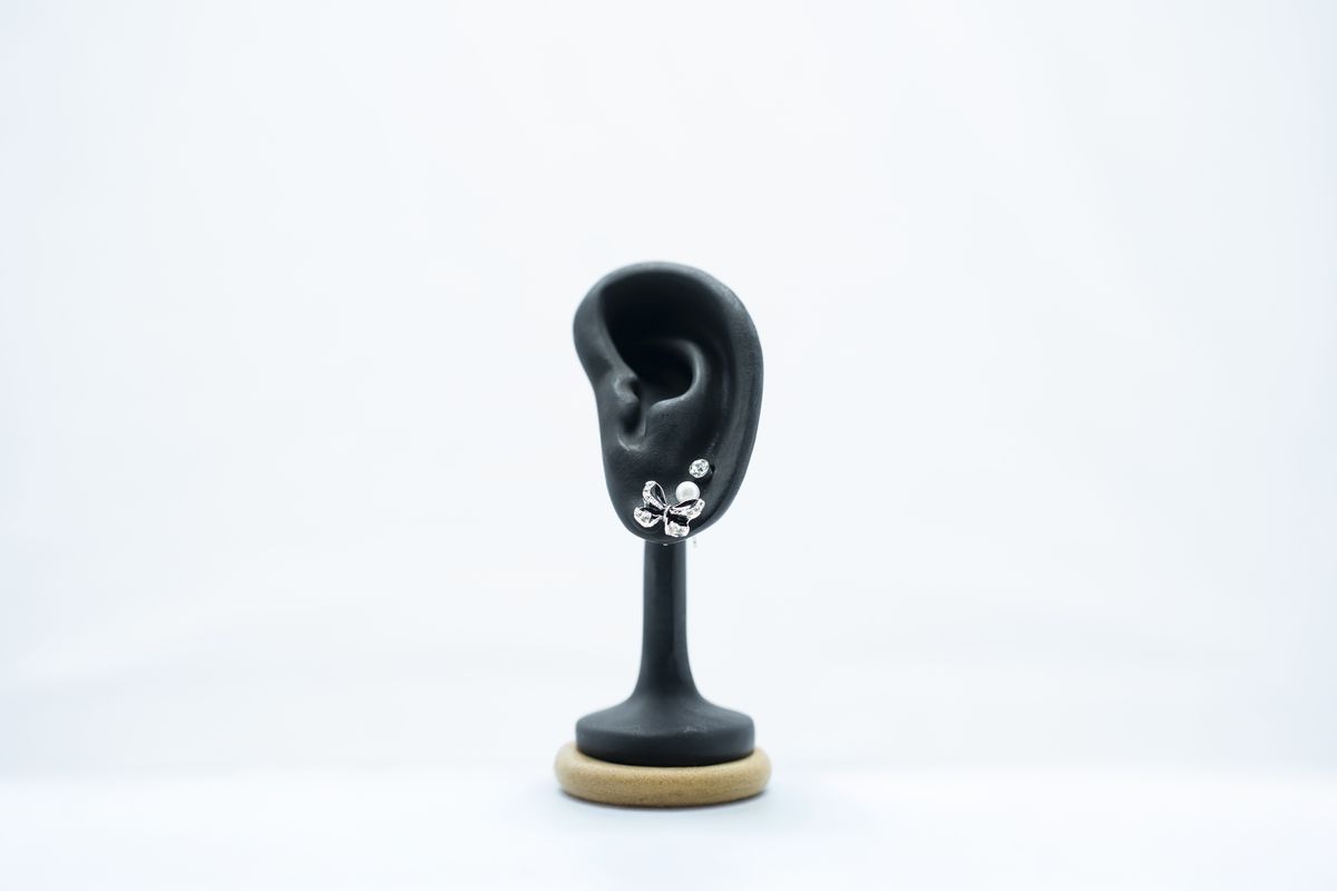 Hollow Heart-Shaped Stud Earrings - Image 2